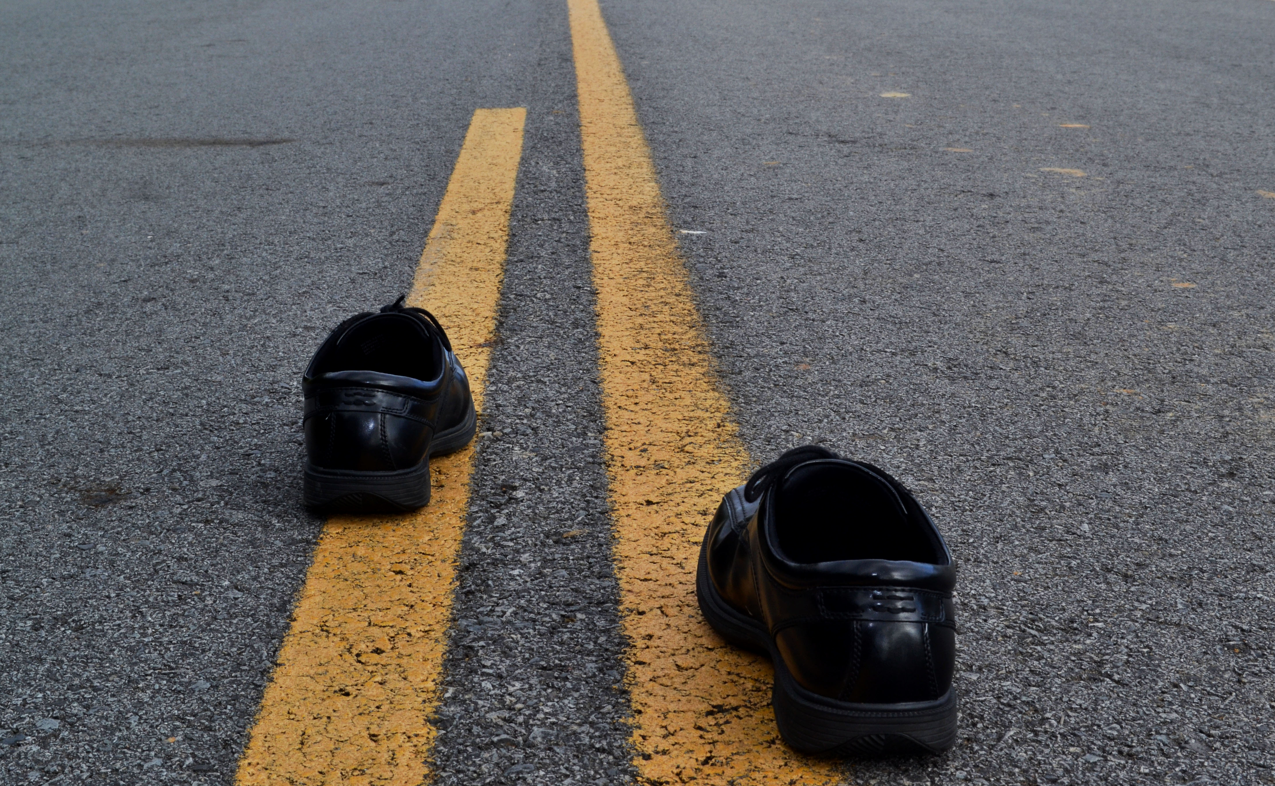 Nice shoes in the middle of the road